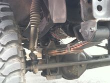 Truck came with pro com 4" lift. Extremely rough ride. No down travel.