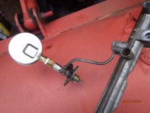 different view showing injector, union fitting, adapter, and gauge.  has been functioning for several months as of this date (4-12-2016).
