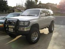 With the manik brush guard, Weld outback wheels, and downey suspenion