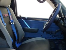 finally installed driver seat with trd Seats out of Xrunner. mounted racing harness and reupholstered door Panel.