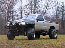 4 inch lift 33/13.50 LTB swampers 15x14" wide chevy truck rallys