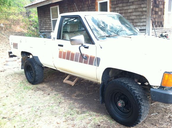 hit the window trim with a little touch up black. the truck is starting to clean up a little.  I see potential.