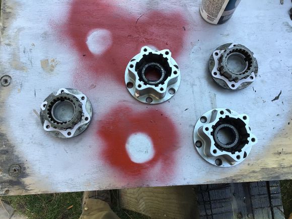 Hub bodies reassembled with the Free Wheel Hub Ring, spacer and Inner Hub. To either side of the hub bodies