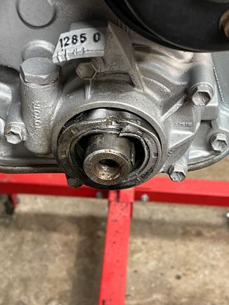 Instead of prying it out, deform it with a hammer and screwdriver