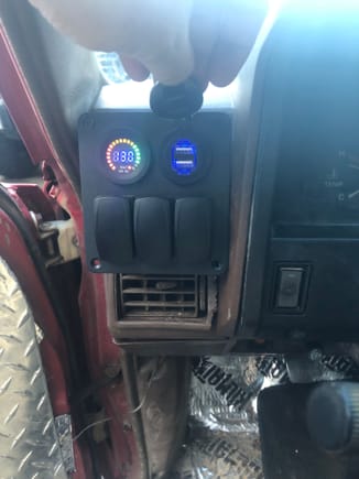 The lights on the voltage reads no matter if the key is on or off & matches up with my fluke meter , there a blue lights behind each toggle switch when flipped on .