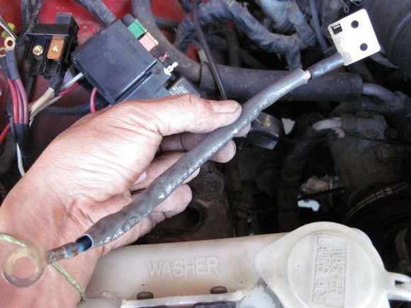 That tab is integrated with fusible link WIRE going to batt positive.