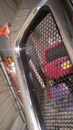 Literally cut out a bunch of the plastic and moved the depth forward and just zip tied the honeycomb mesh in place