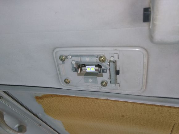 Dome light cover.  Roof liner is trashed. Rear wiper cover (missing from photo also, oops)