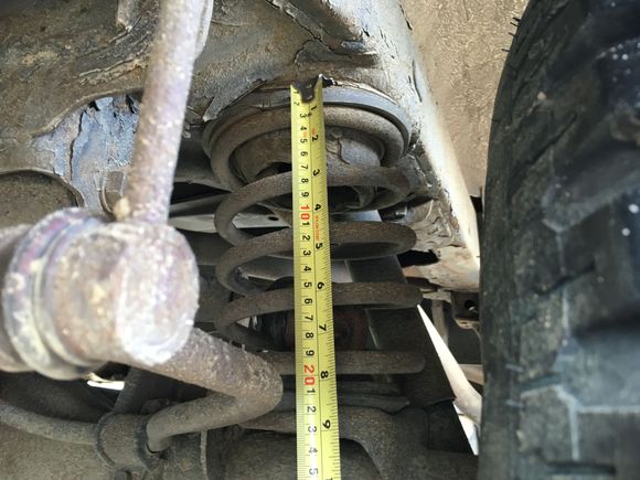 91 4runner
8.5" on fatigued stock spring under load.