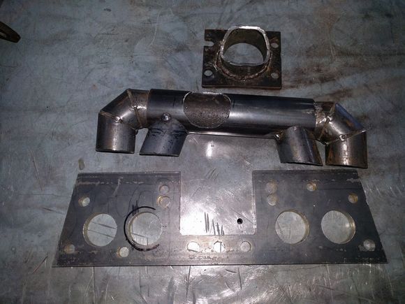 Turbo manifold parts layed out and tacked.