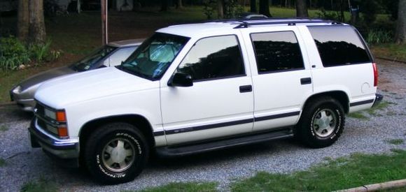 97 Tahoe  Wife's grocery getter.  It is nice for a long trip.  It pulled the Baja across country when we moved back to NC from Kali.  Yes, those are 31's on a 2wd 'Hoe...and yes she will roast them.