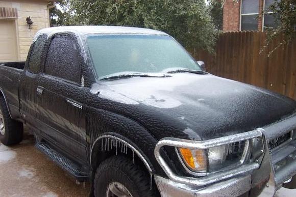 Another view of my truck in our ice freeze!
