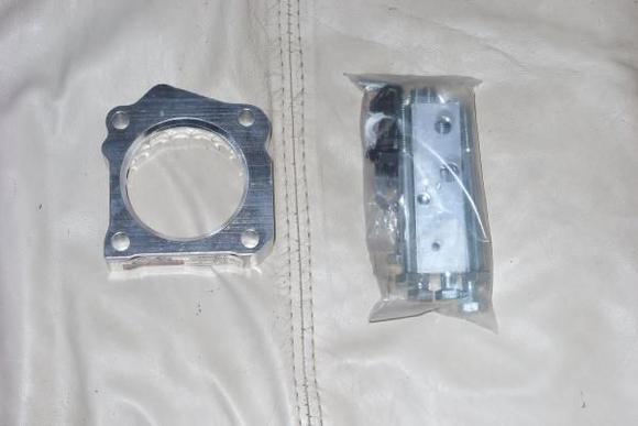 Double-Helix Throttlebody Spacer. Q: Does it work?  A: I think so, but i installed it same time as Deckplate Mod, so hard to tell w/o DYNO. If it DOES work. I have one!