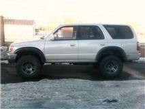 after we first lifted it we a coil spacer and the old spring ans they sank. front end is way lower the the rear.