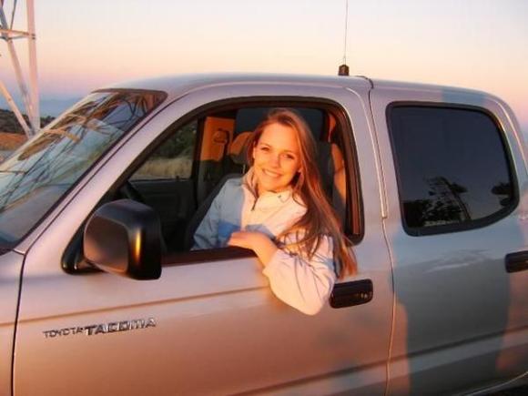My kid.... she loves wheelin' around the ranch..