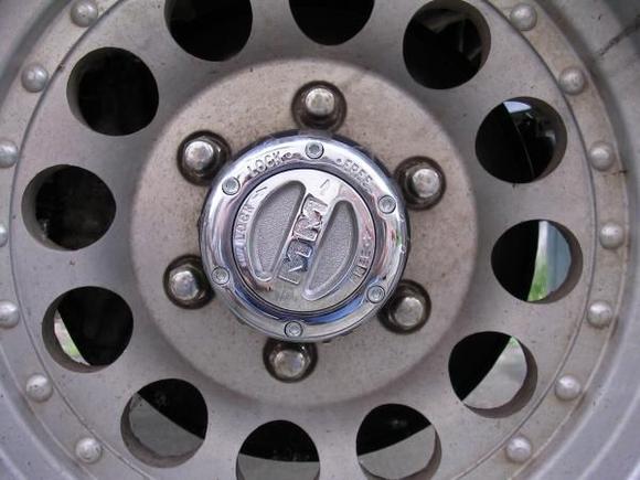 Hub assembled, I still was not able to use the snap as planned but used the step washer I had from the SW hubs with bolt and lock-tite in axle. Doing this I could tighten the bolt all the way down without taking bearing play out. Test drove with all problems gone! Yes!