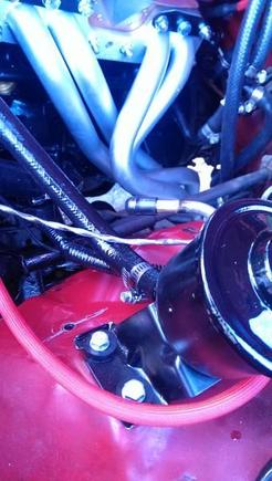 return line for the power steering reservoir temporarily capped off to flush the entire system