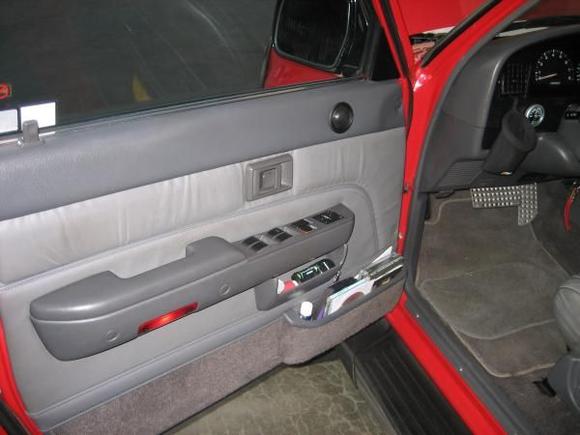 very useful mod.  Underneath the power window switches.