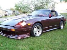 My favorite picture of all! This was all done in 2002. The car looks nothing like this anymore. While upgrading the fuel system I ran into some electrical problems and she has not moved since Aug. 2004. I have no garage so the elements have really taken their toll on the paint. I plan on getting her back up and running within the next year.