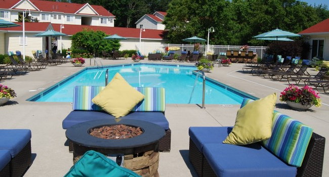Relax by the outdoor heated pool with spacious sun decks and a grilling area.