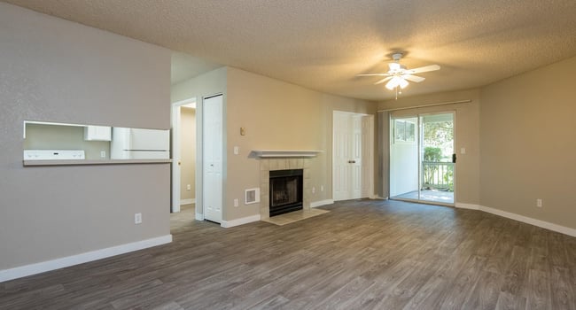 Three Bedroom | Living Room with Fireplace and Patio