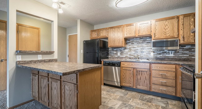 Our renovated apartments feature updated cabinetry, countertops, appliances and tile backsplash.