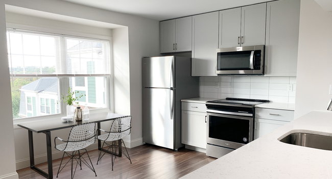 Our renovated kitchens offer brand new cabinetry, quartz countertops, and stainless steel appliances